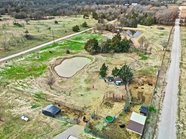 bird's eye view featuring a water view and a rural view