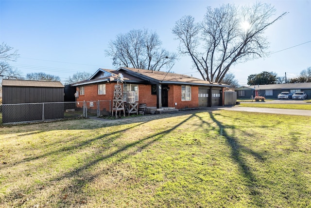 single story home featuring a front lawn