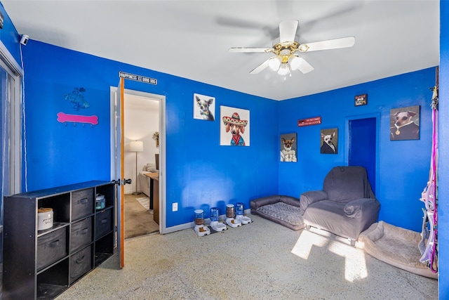 bedroom featuring connected bathroom and ceiling fan