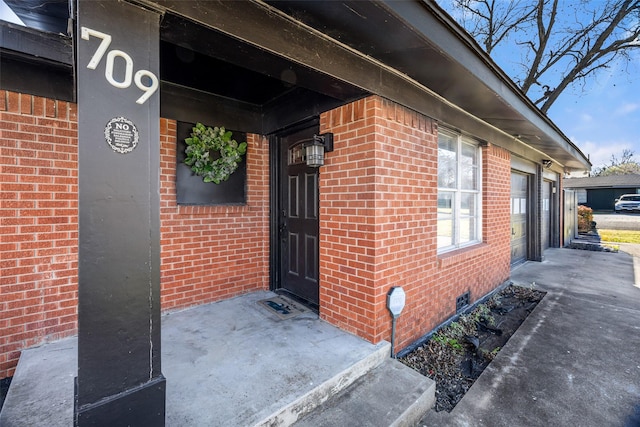 entrance to property with a garage