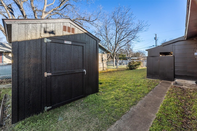 view of outdoor structure featuring a yard