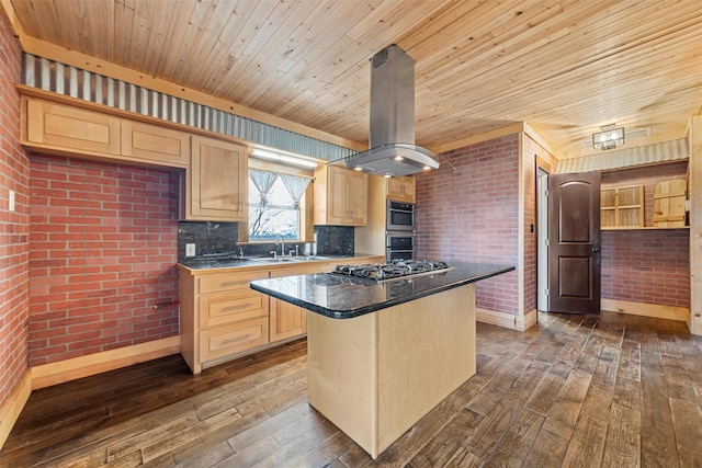 kitchen with island exhaust hood, dark hardwood / wood-style floors, a center island, and light brown cabinetry