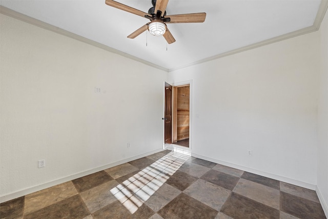 unfurnished room featuring stone finish flooring, ornamental molding, a ceiling fan, and baseboards