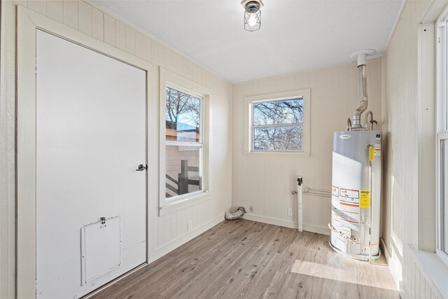 bonus room with lofted ceiling, a barn door, and carpet floors