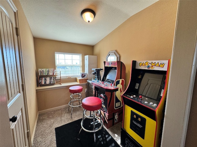 office with a textured ceiling and carpet