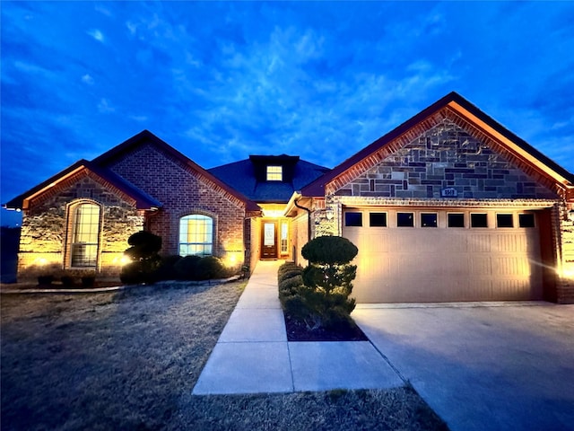 view of front of property featuring a garage