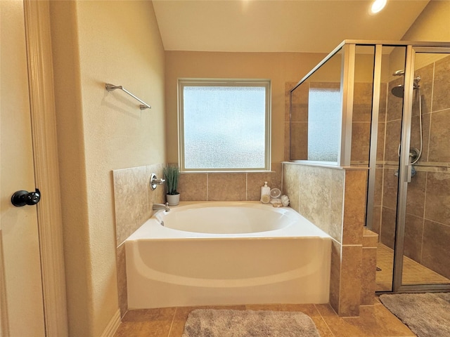 bathroom with shower with separate bathtub