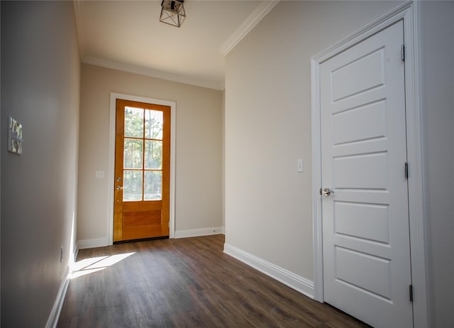 doorway to outside with ornamental molding and dark hardwood / wood-style flooring