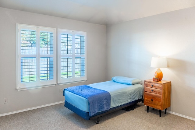 bedroom featuring carpet flooring