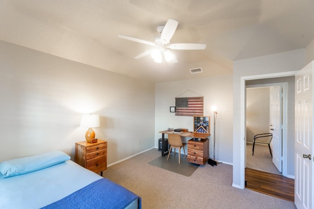 bedroom with ceiling fan and carpet floors