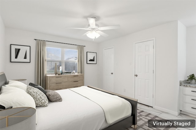 bedroom featuring ceiling fan