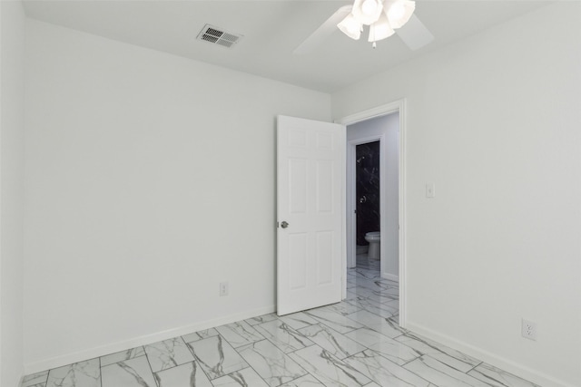 empty room featuring ceiling fan