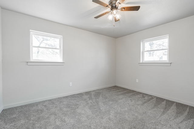 unfurnished room featuring carpet floors and ceiling fan