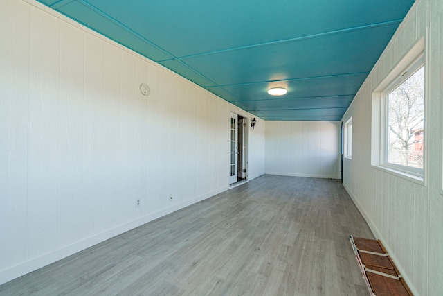 unfurnished room featuring light hardwood / wood-style floors