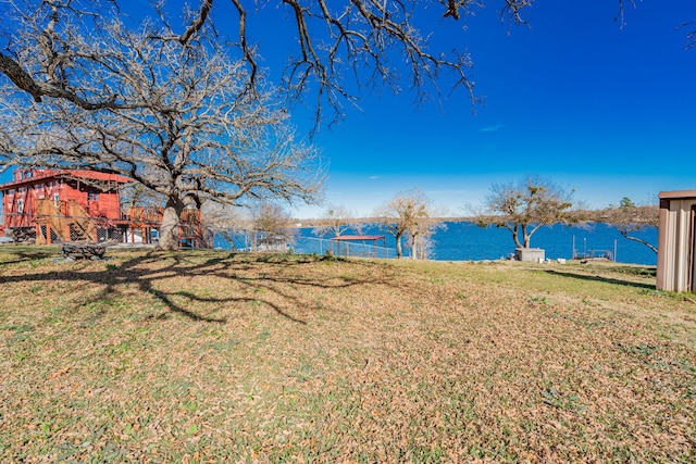 view of yard with a water view