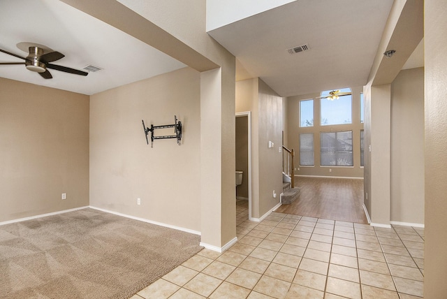 hallway featuring light tile patterned flooring