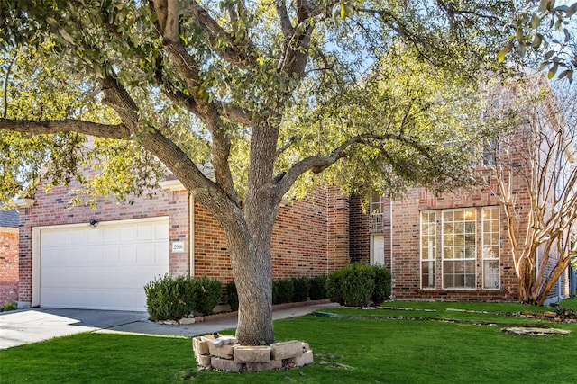 view of front of house featuring a garage and a front yard