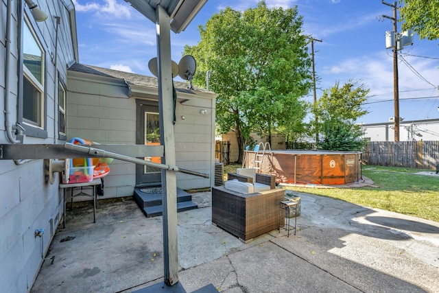 view of patio featuring a pool