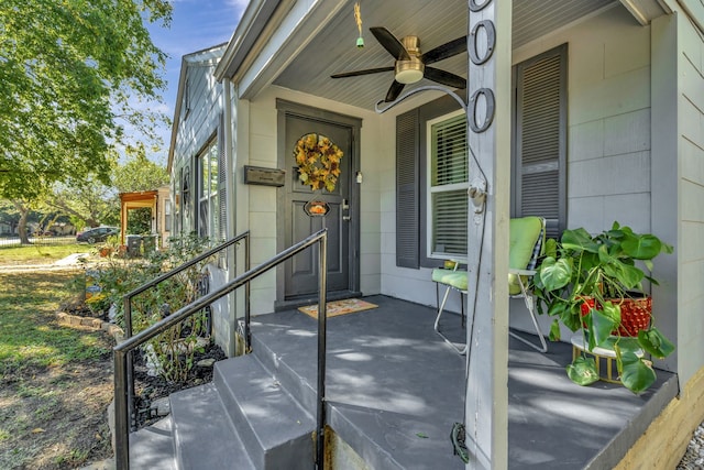 property entrance featuring ceiling fan and covered porch