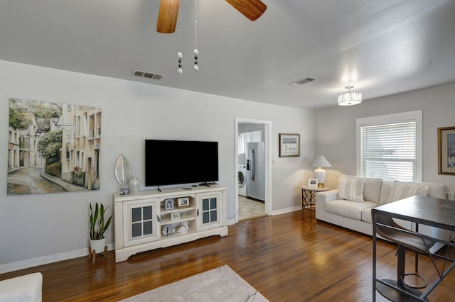 living room with dark wood-type flooring