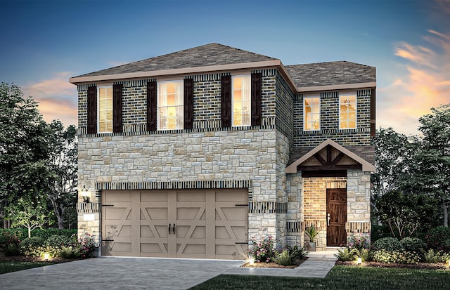 view of front of house with a garage