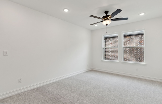 dining room featuring baseboards, light wood-style floors, and recessed lighting