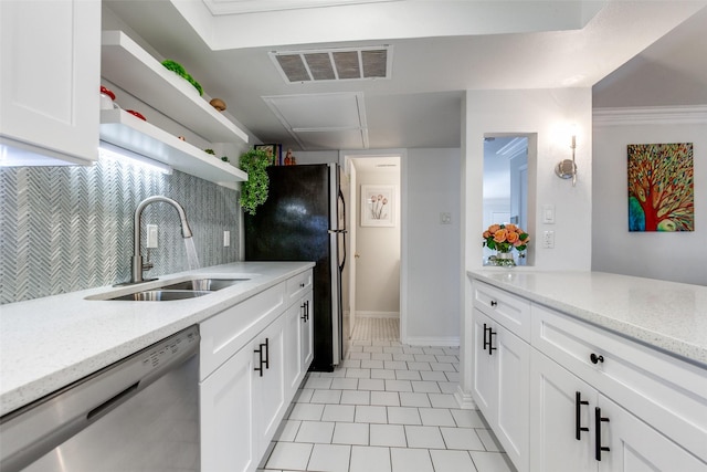 kitchen with visible vents, light stone counters, appliances with stainless steel finishes, open shelves, and a sink