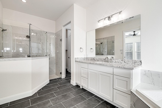 bathroom with ceiling fan, vanity, tile patterned flooring, and separate shower and tub