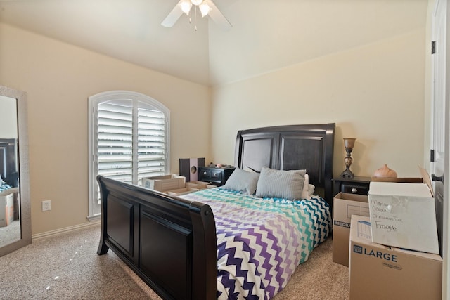 bedroom with light carpet, ceiling fan, high vaulted ceiling, and baseboards