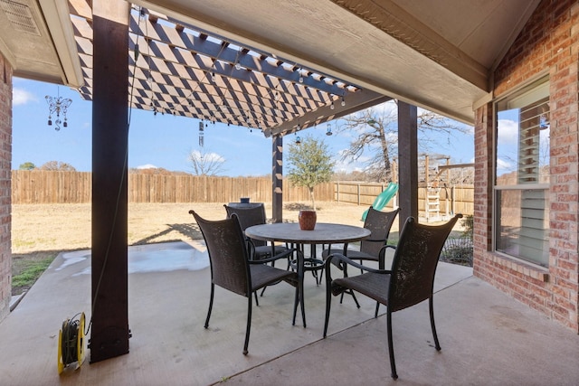 view of patio with outdoor dining space, a playground, a fenced backyard, and a pergola