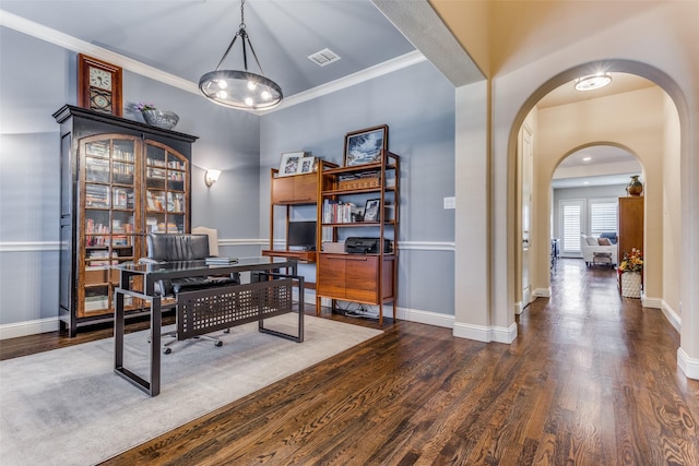 office area with ornamental molding and dark wood-type flooring