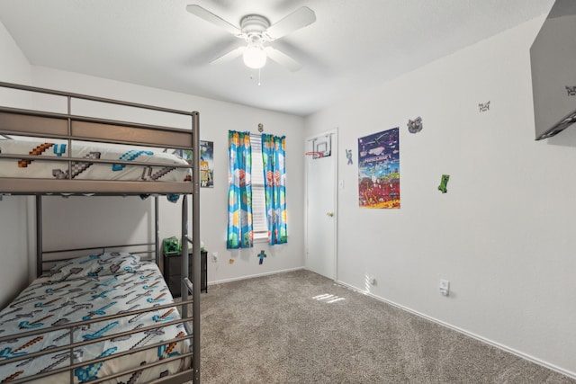 unfurnished bedroom featuring ceiling fan and carpet floors