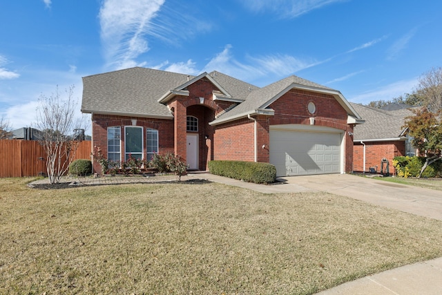 front facade featuring a front yard and a garage