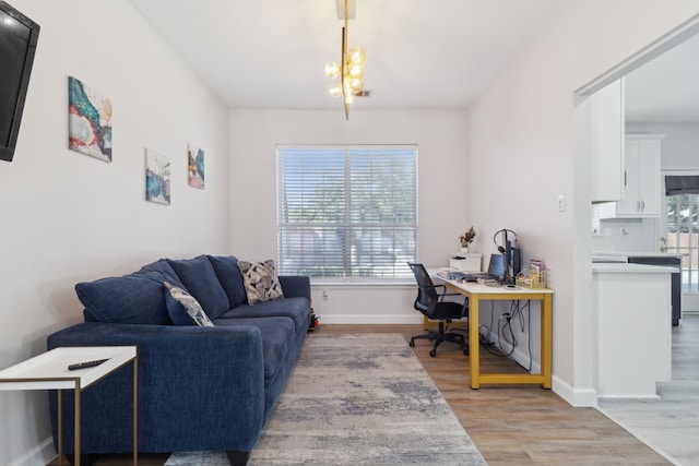 office with light hardwood / wood-style floors