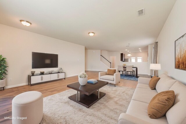 living room with light wood-type flooring