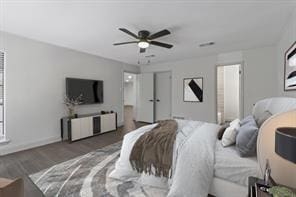 bedroom with dark hardwood / wood-style flooring and ceiling fan