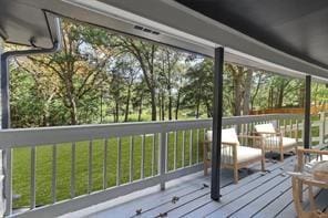 sunroom / solarium featuring a healthy amount of sunlight