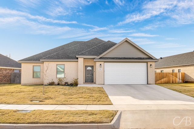 ranch-style home with a front lawn and a garage