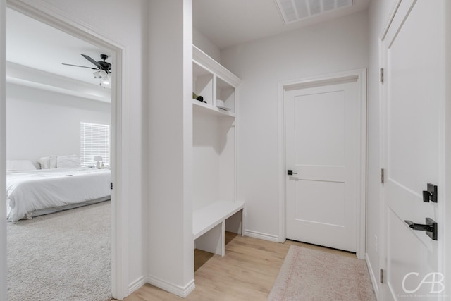 mudroom featuring ceiling fan and light hardwood / wood-style flooring