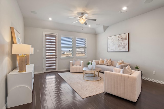 living room with ceiling fan and dark hardwood / wood-style floors