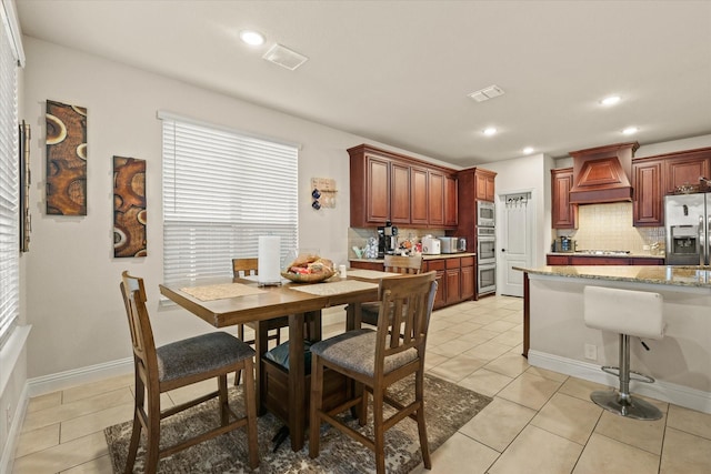 view of tiled dining area