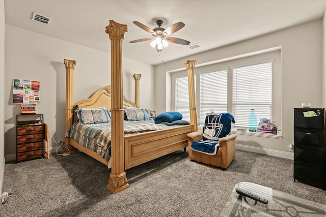 carpeted bedroom with ceiling fan and decorative columns