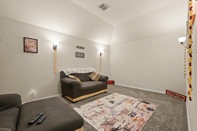 carpeted cinema featuring lofted ceiling