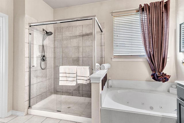 bathroom with tile patterned floors, vanity, and plus walk in shower