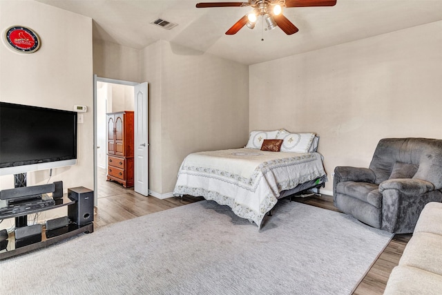 bedroom featuring ceiling fan and light wood-type flooring