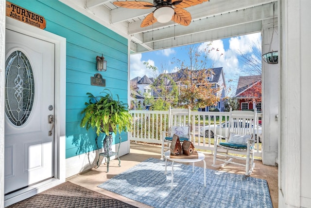 exterior space featuring ceiling fan