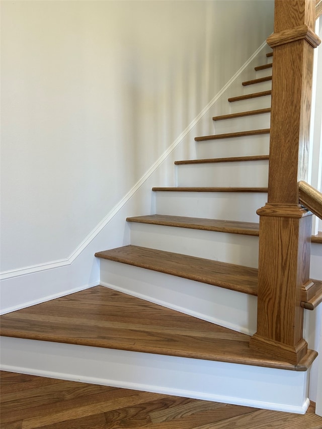 stairway with baseboards