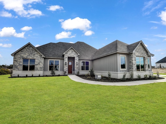 view of front of home with a front lawn