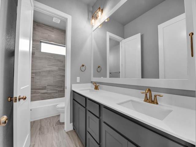 170 Fan Mill Trl, Weatherford, TX 76085 - full bathroom featuring double vanity, a sink, marble finish floor, and toilet