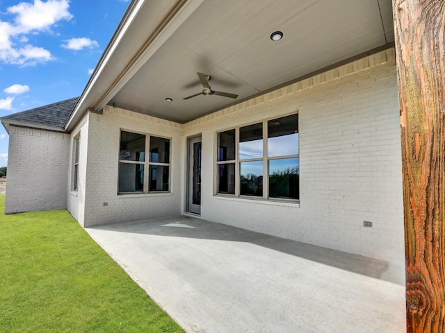 view of patio / terrace featuring ceiling fan